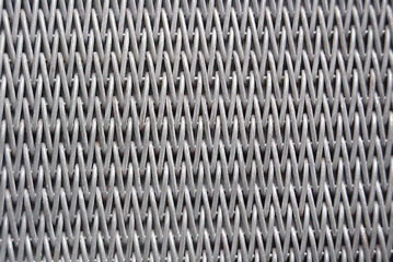 Conveyor belt mesh with 13mm crimped rod pitch and with round spiral wire.