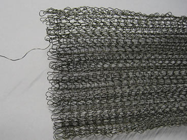A sheet of black wire knitted mesh