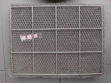 Knitted mesh demister pad in rectangle shape with welded round rod grid.